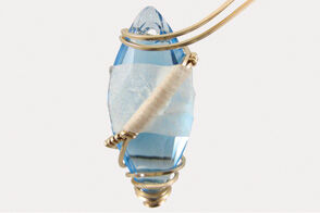 Wire wrapped around marquise pendant